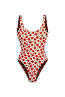 Reversible white and poppy red Acacia one-piece swimsuit by Verdelimon, shown from the front on a model.