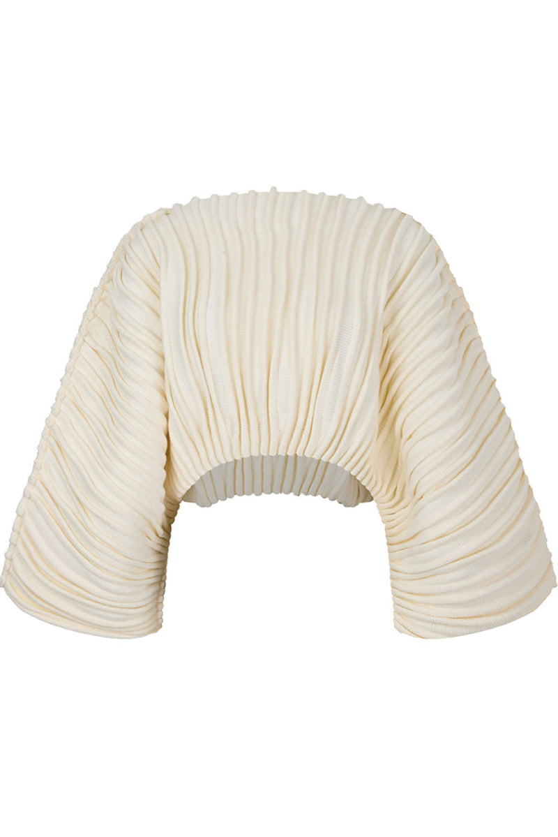 Ivory accordion snail sweater by MAZ Manuela Álvarez featuring textured, layered knit design in a cozy sweater style.