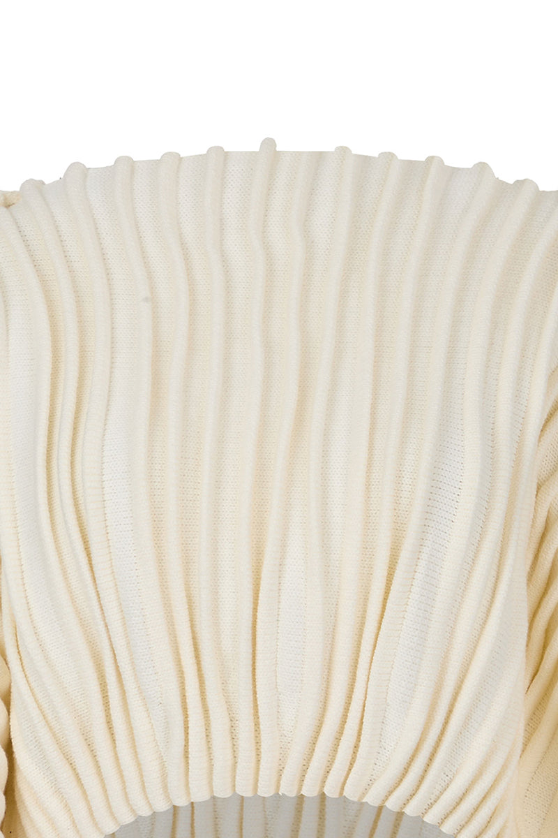 Ivory accordion snail sweater by MAZ Manuela Álvarez featuring textured, ribbed knit pattern and long sleeves.