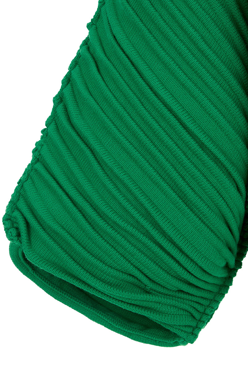Maz Manuela Álvarez accordion snail sweater in Milano green, showing the textured, ribbed knit pattern and cozy fit.