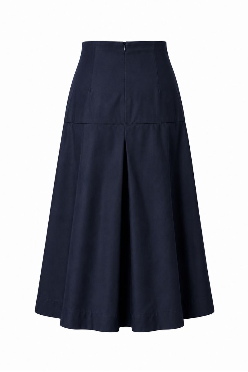 Navy blue ADA midi skirt by ANA + MARIA displayed on a ghost mannequin, showcasing its elegant, flowy fabric and classic design.