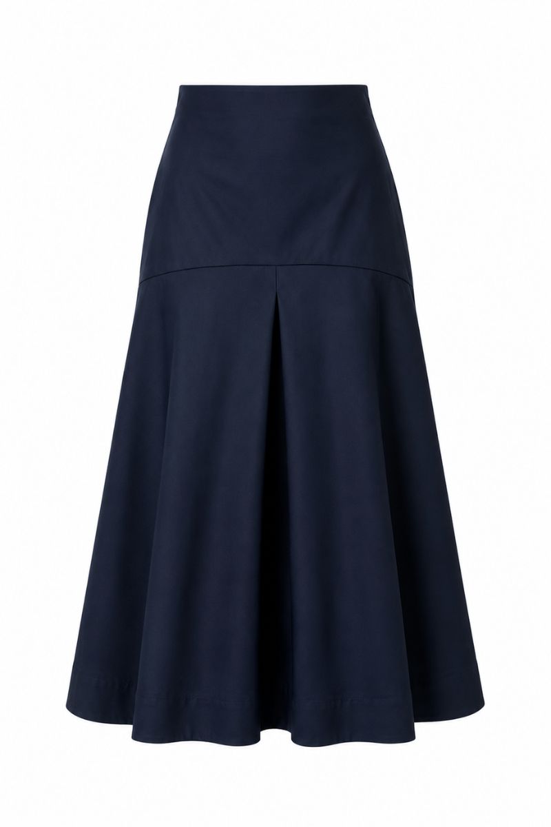 Navy blue ADA midi skirt by ANA + MARIA displayed on a ghost mannequin, showing the flowy fabric and elegant length.