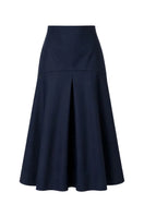 Navy blue ADA midi skirt by ANA + MARIA displayed on a mannequin, showcasing its flowy fabric and elegant length.