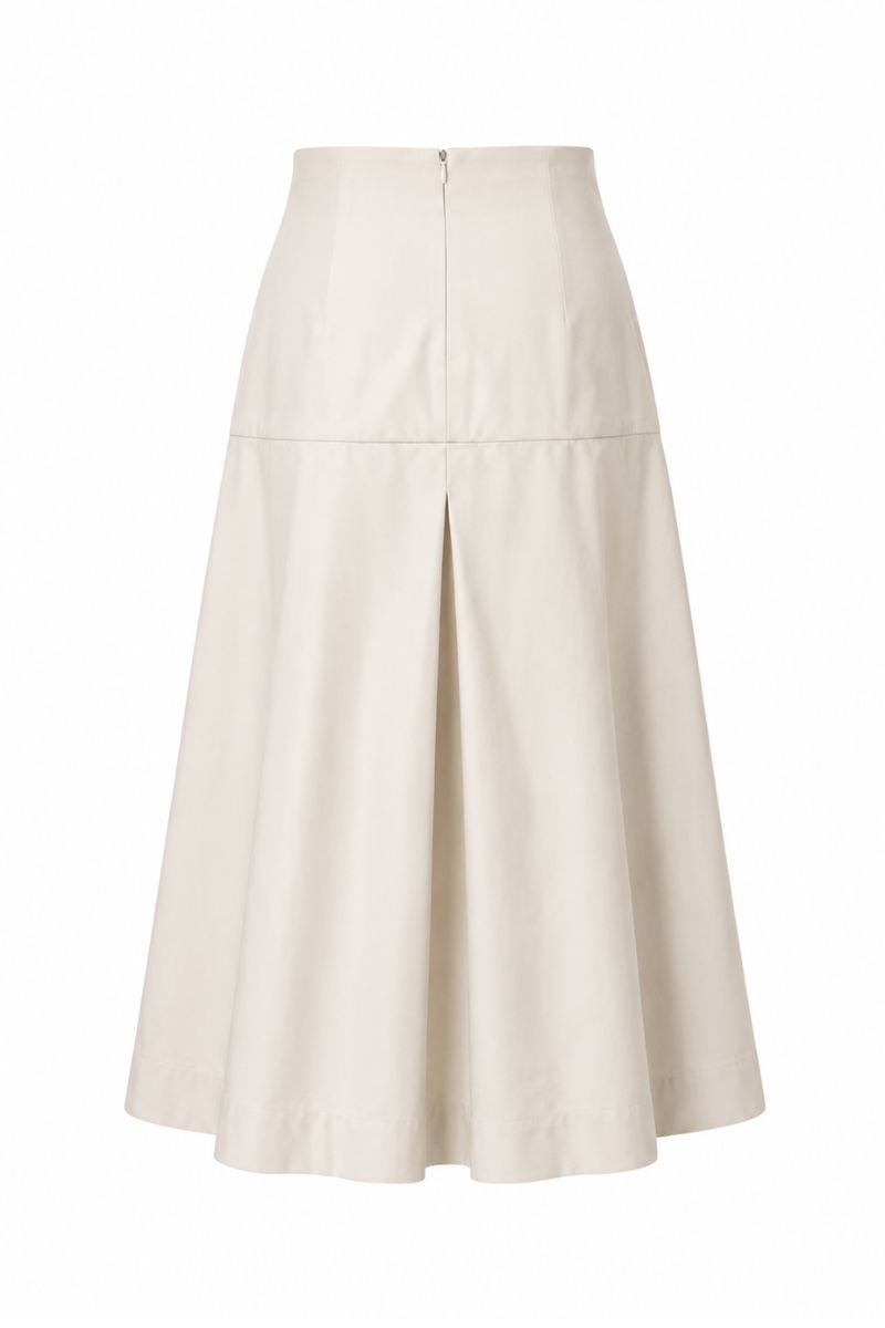 Ana + Maria ADA Sand midi skirt displayed on a ghost mannequin, showcasing its elegant design and flowy fabric.