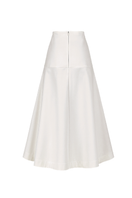 Ivory ADA midi skirt by ANA + MARIA, shown in a ghostly photo on a model, featuring a flowy, elegant design.