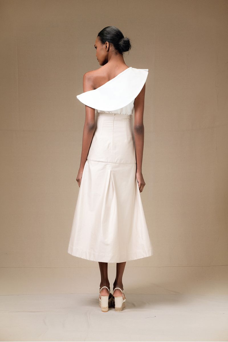 ANA + MARIA ADA skirt in sand, ivory midi skirt with flowy fabric, stylish and versatile for everyday wear.