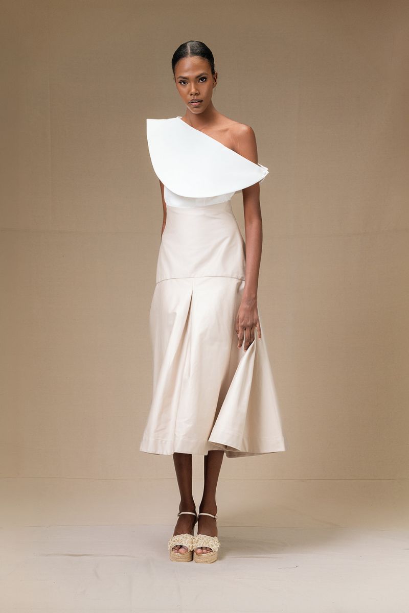 ANA + MARIA ADA skirt in sand, ivory midi skirt with a flowy silhouette, perfect for casual or sophisticated looks.