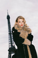 Nana Jacqueline Adriana faux fur coat in black and brown, showing a stylish, plush coat with a textured fur appearance.