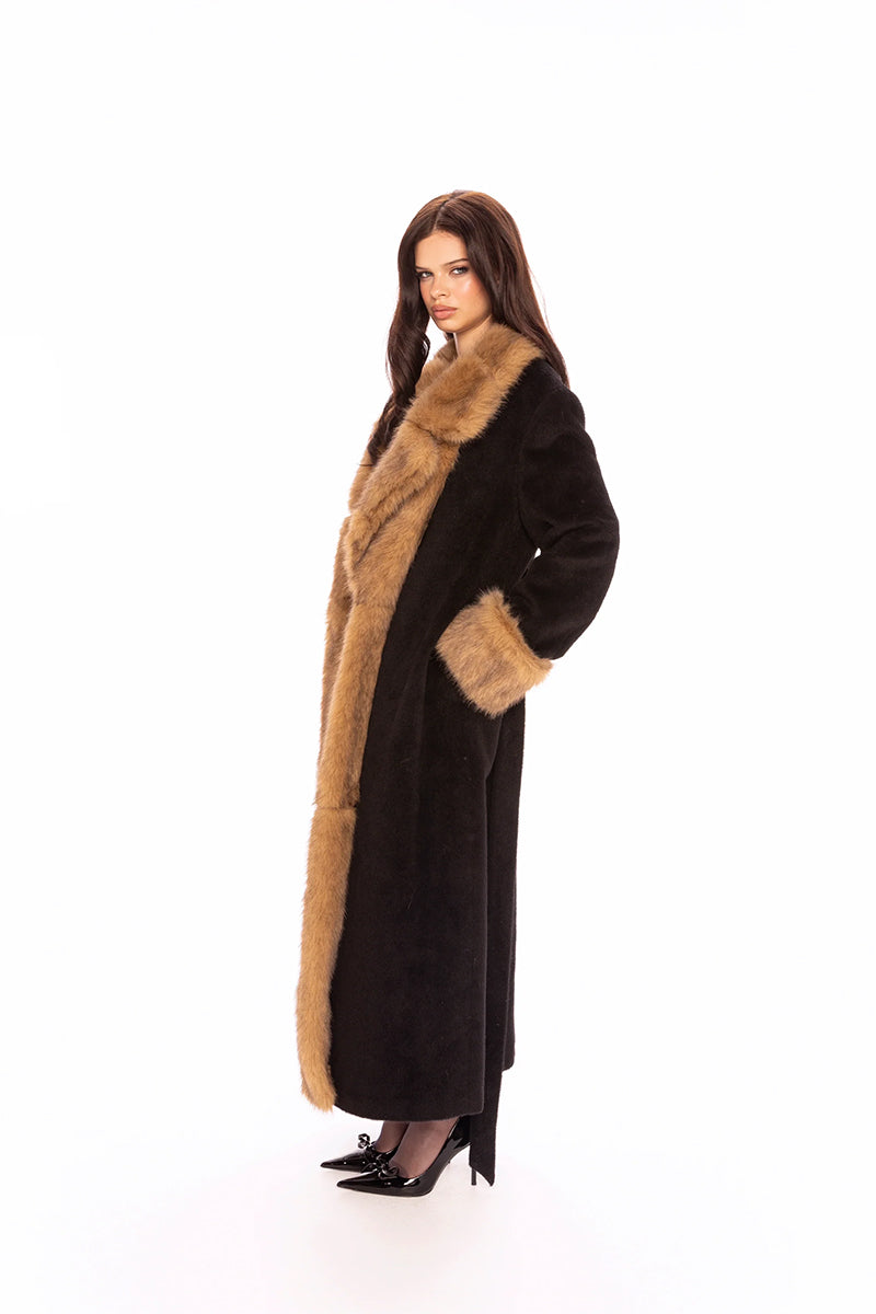 Nana Jacqueline Adriana faux fur coat in black and brown, shown with a plush, textured fabric and stylish collar detail.