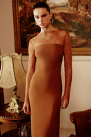 Elegant black KHOFI Maxi Dress by Gigii's with flowing fabric and stylish design, perfect for formal occasions.