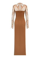 Gigii's Khofi Maxi Dress shown in a flowing fabric, featuring elegant design and vibrant color, perfect for stylish summer wear.