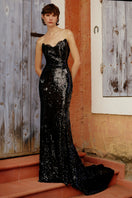 Elegant pink Katie gown by Gigii's featuring flowing fabric and intricate detailing, perfect for formal occasions.