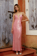 Elegant Rosebella gown by Gigii's featuring flowing fabric and intricate detailing, perfect for formal occasions.
