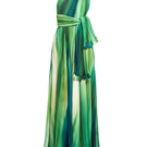 Maylé Vásquez Afluente maxi dress in river green, flowing fabric with elegant design, suitable for casual or semi-formal wear.