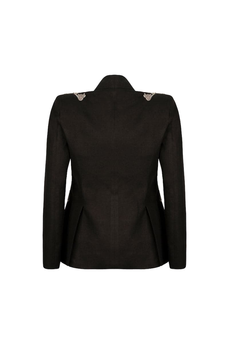 Black beaded blazer by Nadya Shah displayed on a mannequin, featuring intricate beadwork and classic blazer design.