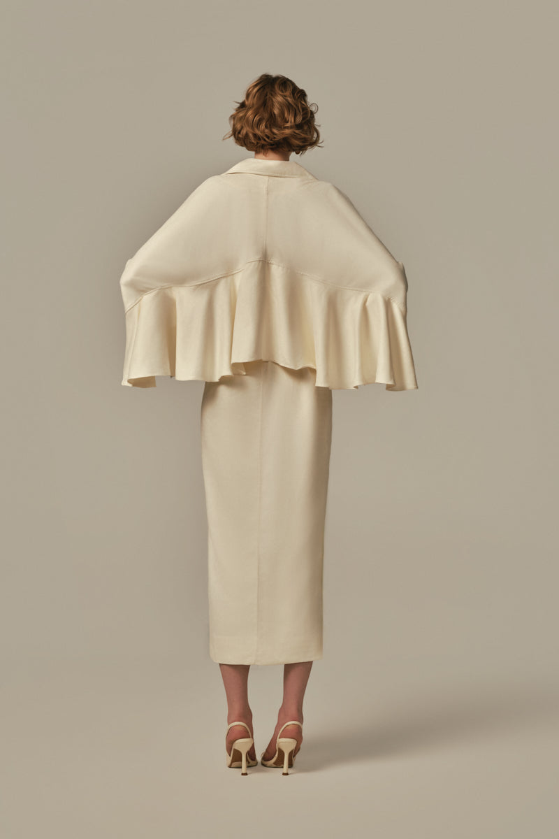 White POEM AILE coat displayed on a model, showcasing stylish design and tailored fit.