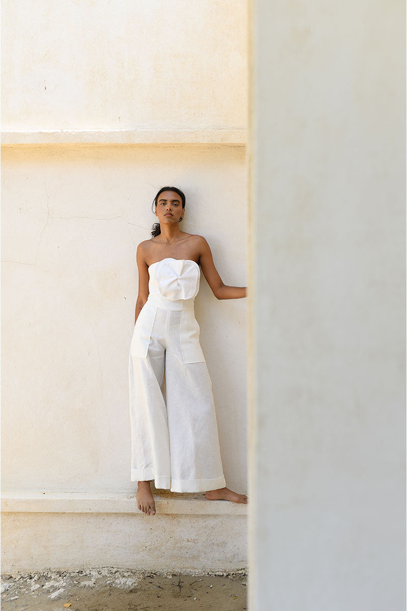 Off-white Alana bustier top by ANA + MARIA, showcasing fitted design with structured bust and stylish detailing.