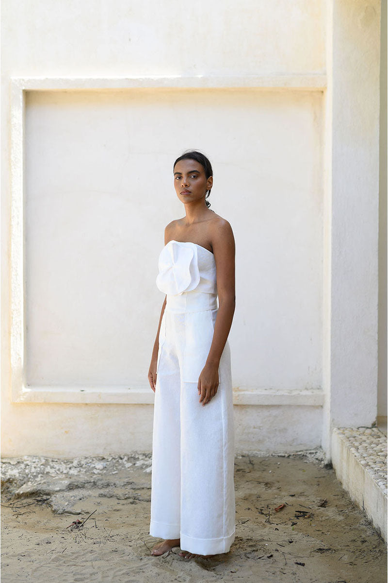 Off-white Alana bustier top by ANA + MARIA, featuring a fitted design and stylish neckline, shown on a mannequin.