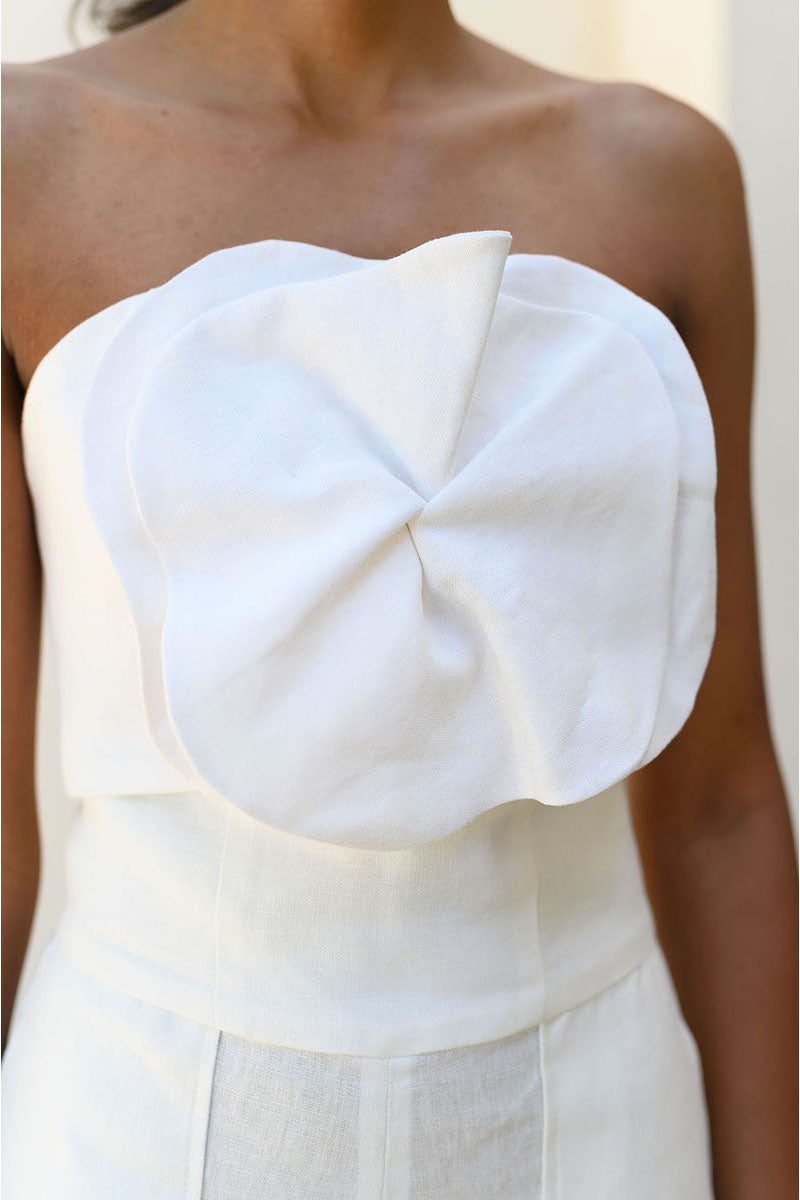 Off-white Alana Bustier top by ANA + MARIA, featuring a fitted design and delicate details, shown on a mannequin.