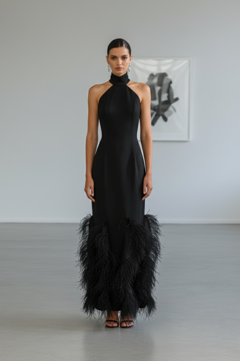 Nana Gotti Alara black gown featuring elegant fabric and stylish design, perfect for formal occasions.