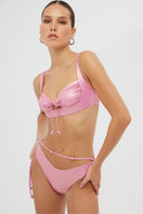Shiny pink Albina bikini set by Maliluha featuring a stylish design, displayed on a mannequin or model.