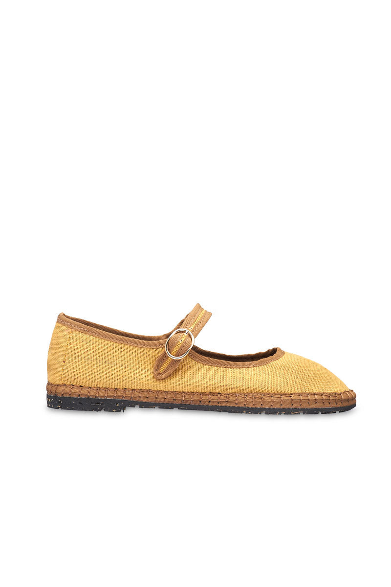 Flabelus Alessia flats in neutral tone, featuring a sleek design and pointed toe, displayed on a white background.