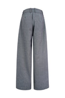 Light blue Alex denim pants by Lorena Saravia displayed on a model, showcasing slim fit and classic denim styling.