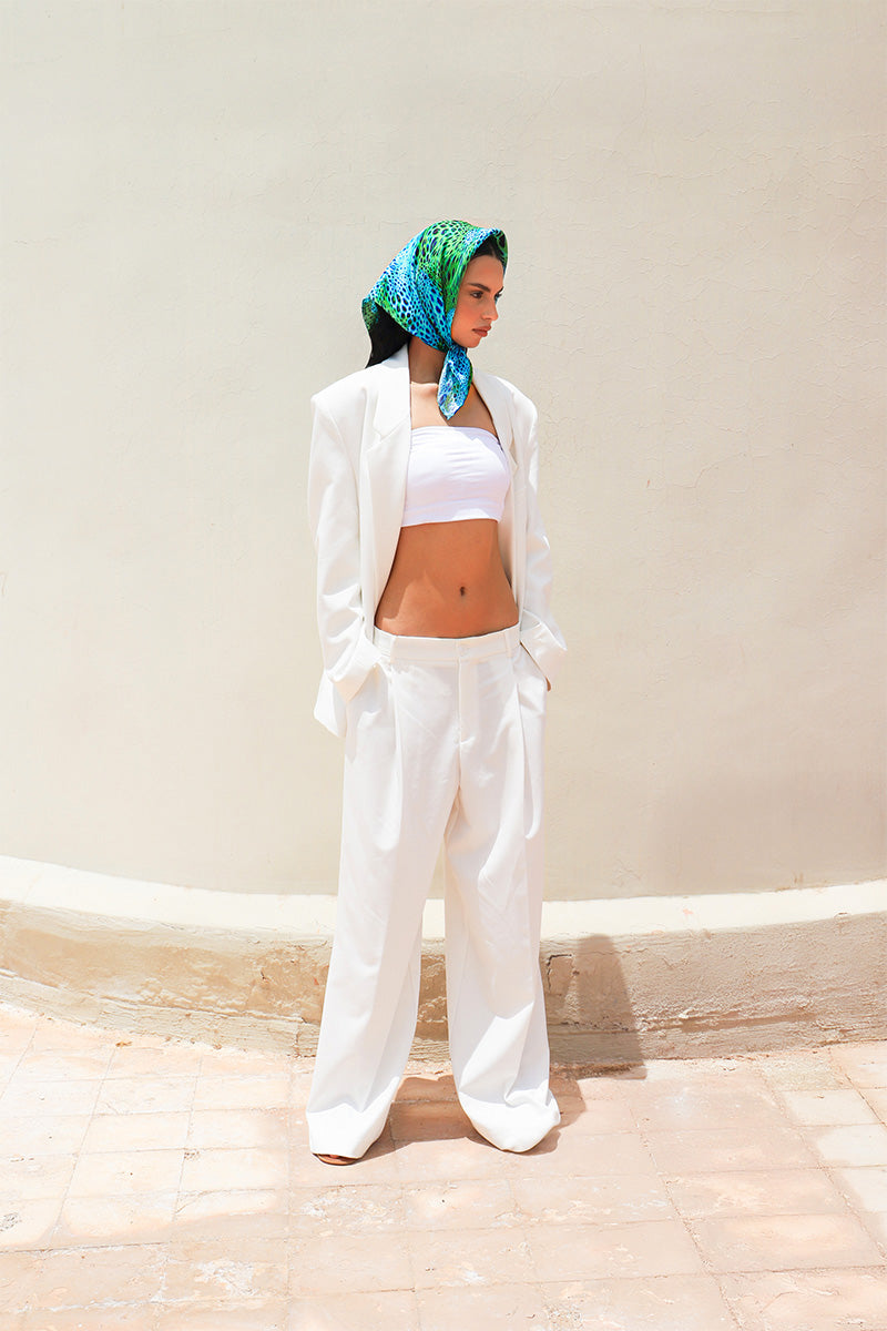 Luxurious Alga Moussard silk scarf by Amel Batita featuring vibrant blue and yellow botanical print, lightweight and elegant.