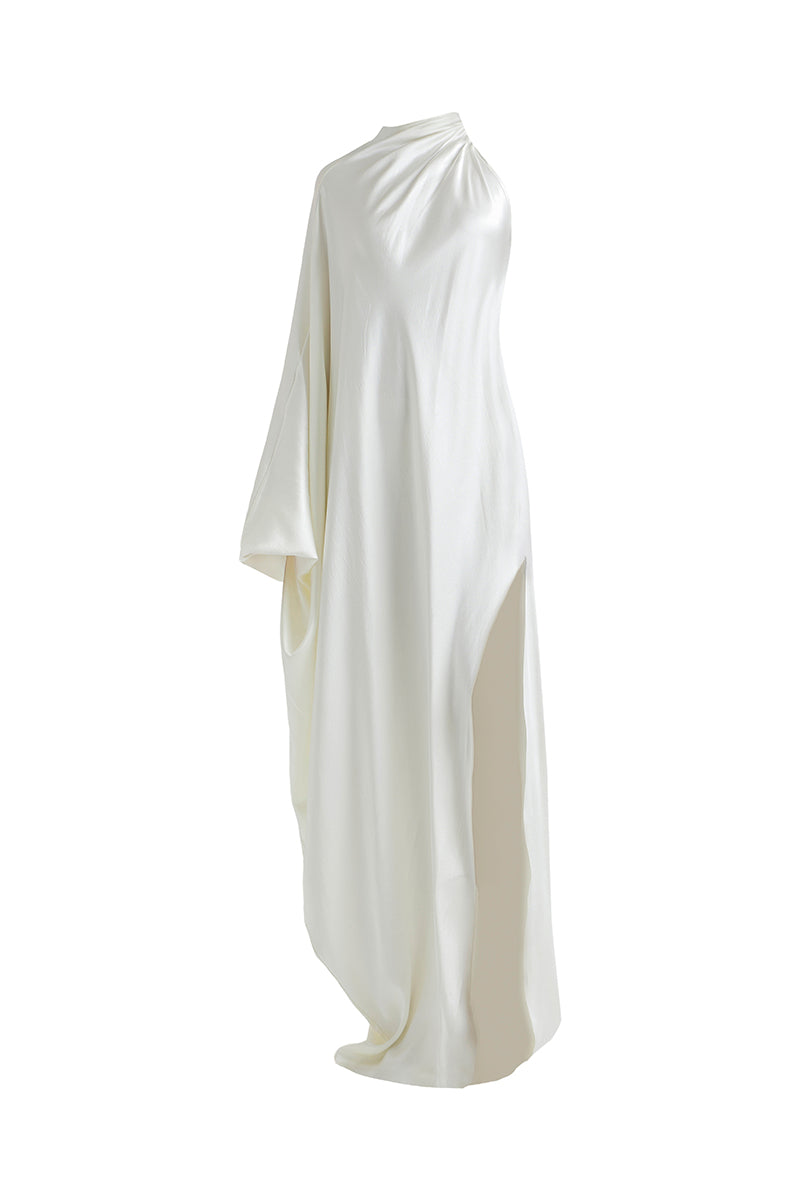 Deme By Gabriella Alice dress in off-white maxi style with flowing fabric and elegant design, shown in a full-length shot.