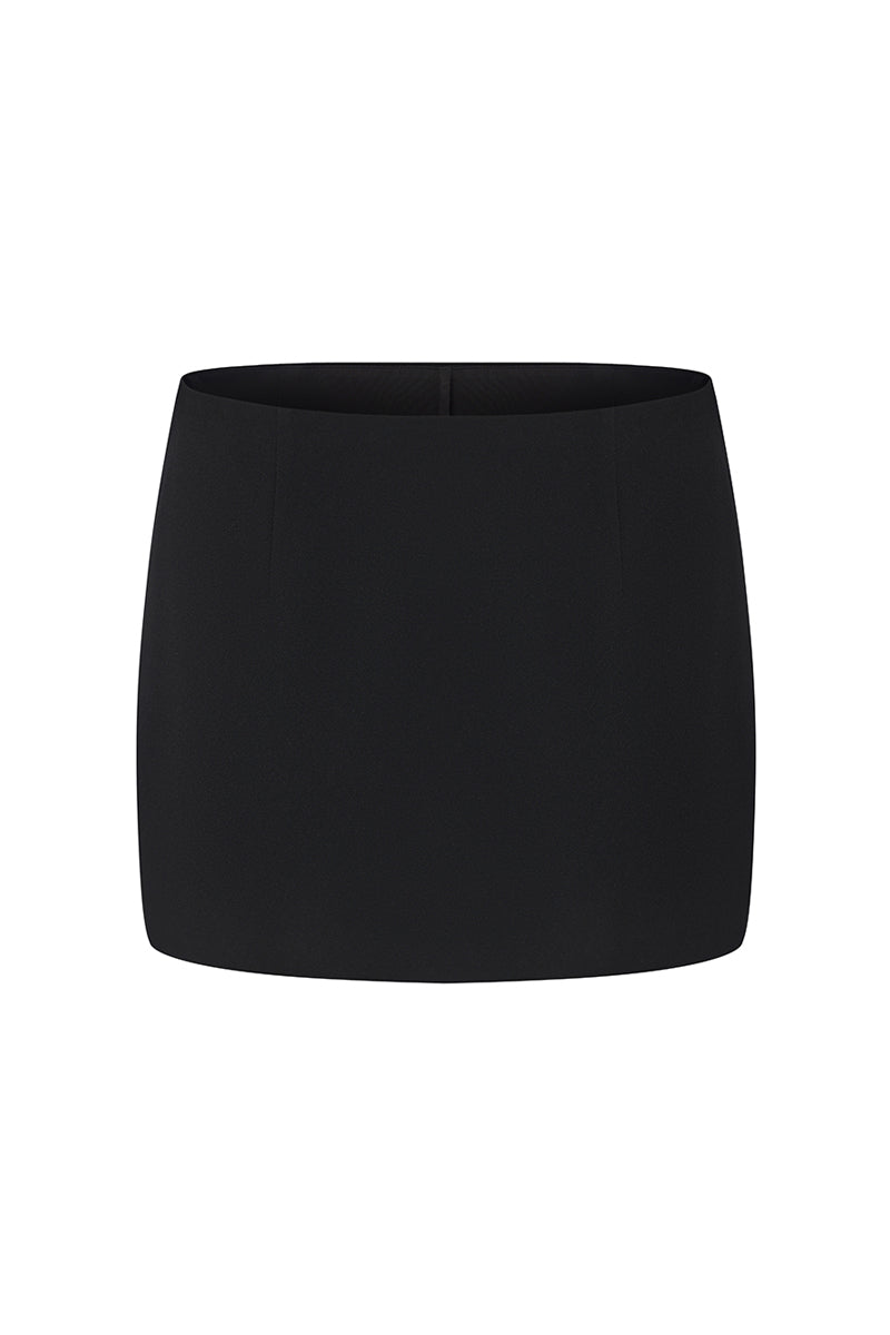Black Alina mini skirt by Nana Jacqueline, straight-fit design, front view showcasing sleek fabric and modern style.