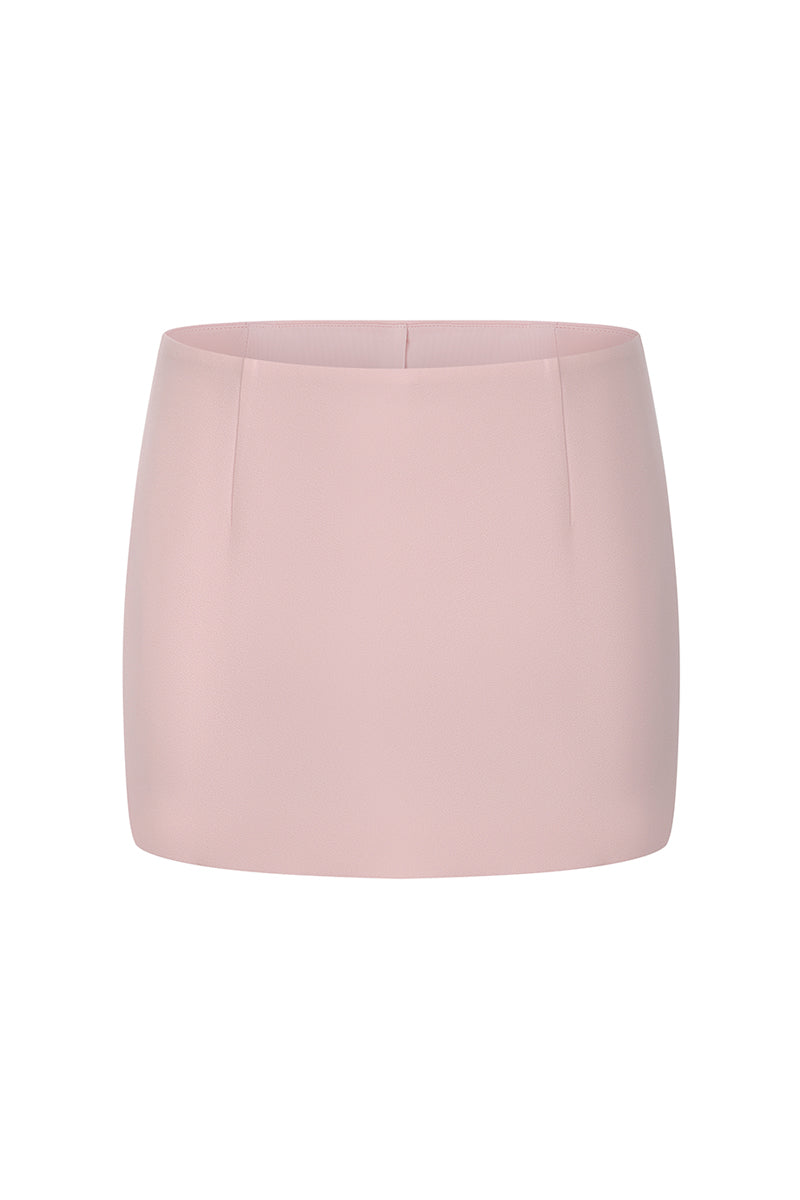 Pink Nana Jacqueline Alina mini skirt with straight fit, shown from the front on a model.