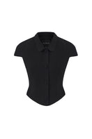 Black Alina top by Nana Jacqueline featuring a waist-cinched design, shown from the front on a model.