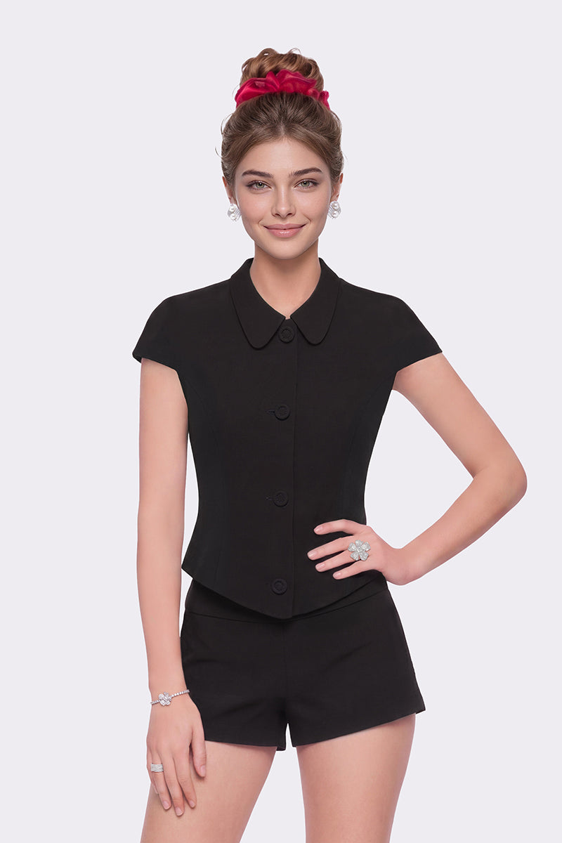 Nana Jacqueline Alina black top with waist-cinched design, stylish women's fashion top displayed on a model.
