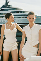 Nana Jacqueline Alina champagne top with waist cinching design, showcased in a fashion campaign image.