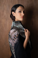 Nadya Shah All About Eve cape jacket in soft fabric with a flowing design, styled with a high collar and elegant draping.