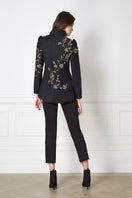 Nadya Shah Allegra Rose Jacket displayed on a hanger, featuring floral design and lightweight fabric for casual outdoor wear.