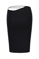 Black Nana Jacqueline Alma midi skirt with an asymmetric hem, shown from the back view. Elegant and stylish women's fashion.
