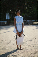 Light blue Almar Bib top by ANA + MARIA, featuring a comfortable fabric and stylish design for casual wear.