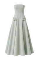 Green Aloe dress by Nihan Peker, elegant gown with flowing fabric and subtle detailing, perfect for formal occasions.