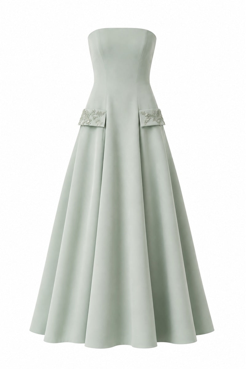 Green Aloe dress by Nihan Peker, elegant gown with flowing fabric and subtle detailing, perfect for formal occasions.