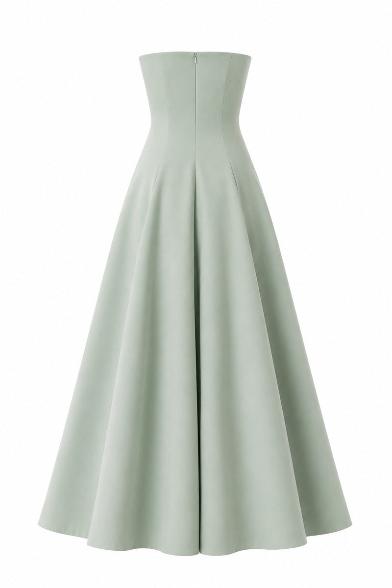 Green aloe print gown by Nihan Peker featuring flowing fabric and elegant design, perfect for formal occasions.