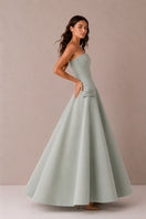 Green Aloe Dress gown by Nihan Peker featuring a flowing design and elegant silhouette, perfect for stylish occasions.