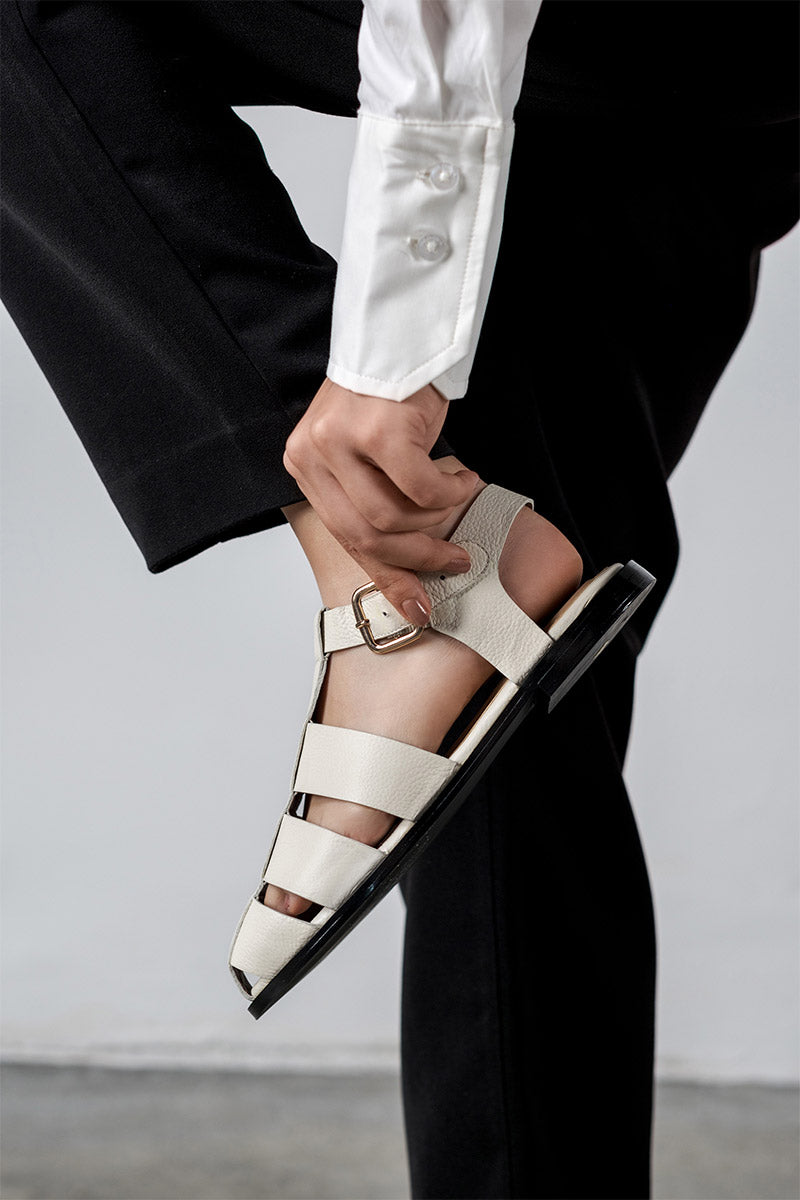 Off-white ALTA Cecilia sandals with open toes and ankle straps, stylish summer footwear on a white background.