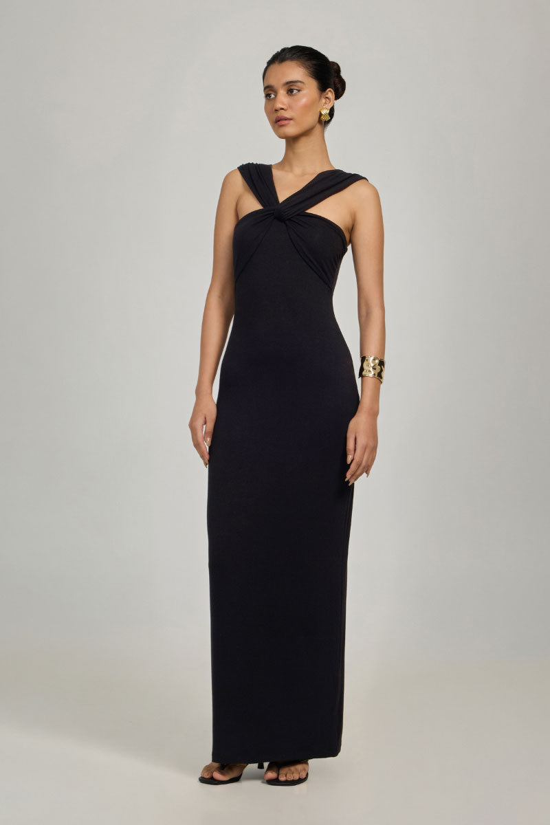Light blue Althea maxi dress from Summer Away with flowing fabric and shoulder straps, perfect for summer wear.