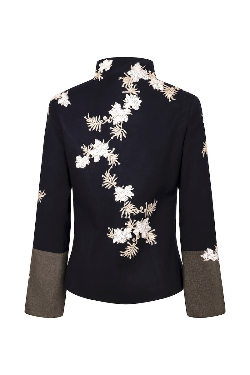 Nadya Shah Alto Mare jacket displayed on mannequin, showcasing the stylish back design of this lightweight jacket.