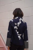 Nadya Shah Alto Mare jacket shown in a stylish, lightweight design with a zip front and water-resistant fabric.
