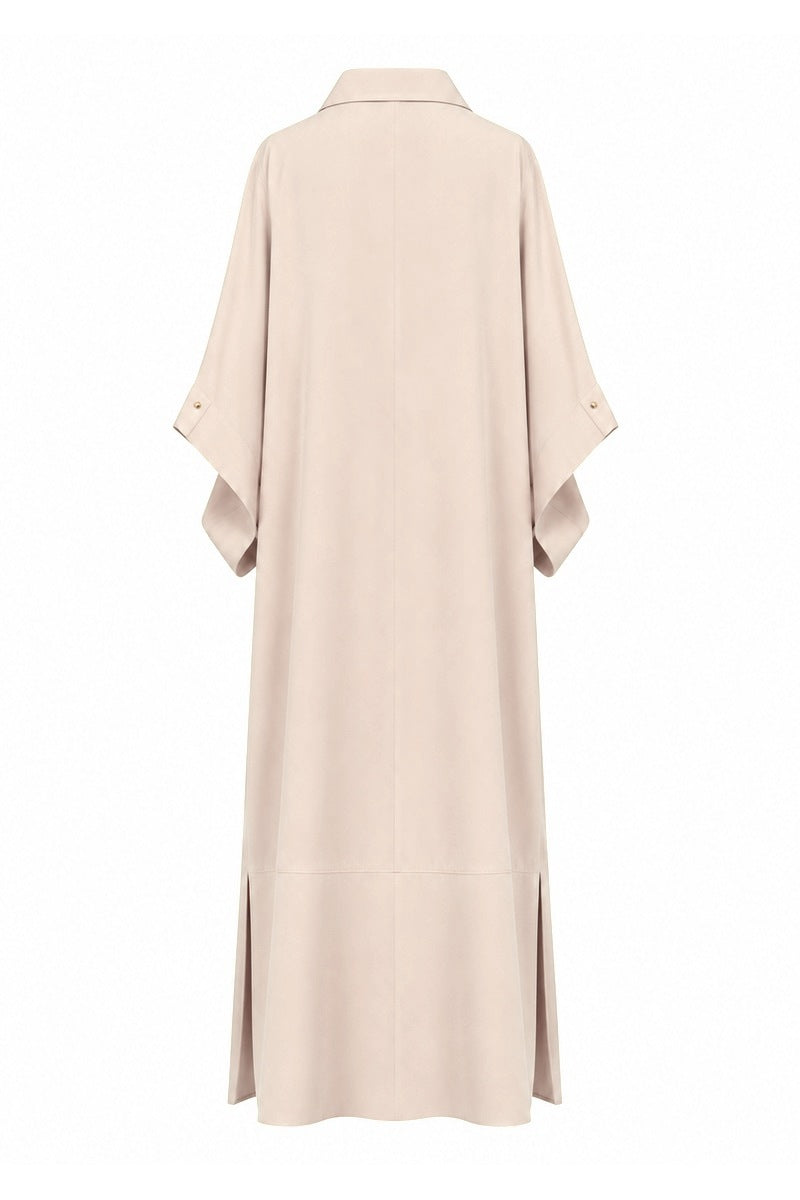 Nihan Peker Alya gown in vanilla color, elegant dress with flowing fabric and intricate details, perfect for formal occasions.