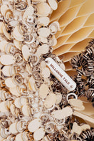Beige Alya off-white shoulder bag with sequin details from Millanne Tale, featuring a stylish design and adjustable strap.