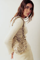 Beige Alya off-white shoulder bag with sequin embellishments from Millanne Tale, stylish accessory with a sleek design.