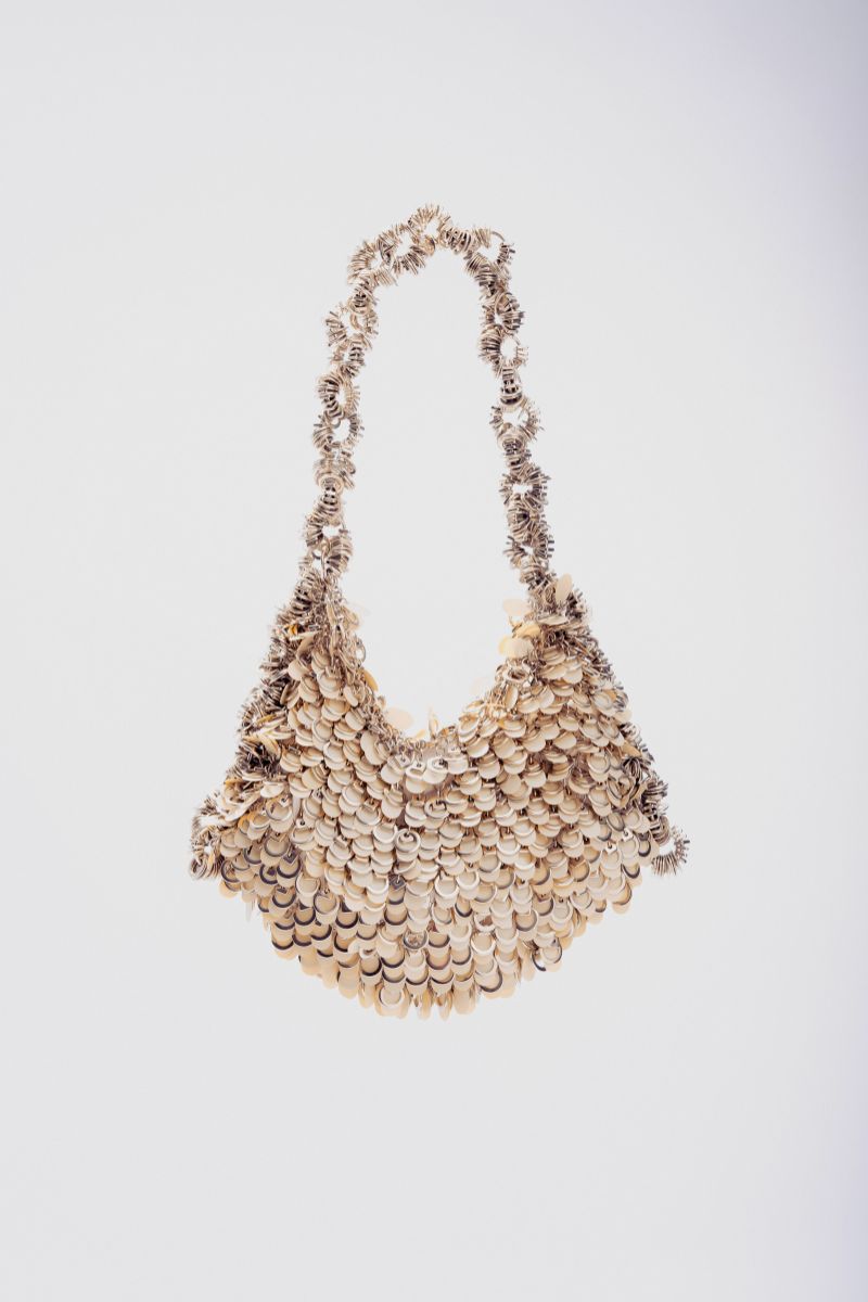 Beige Alya sequin shoulder bag by Millanne Tale with off-white finish, featuring a stylish design and metallic accents.